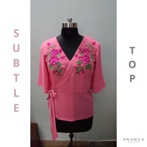 Subtle wrap around top with floral machine embroidery